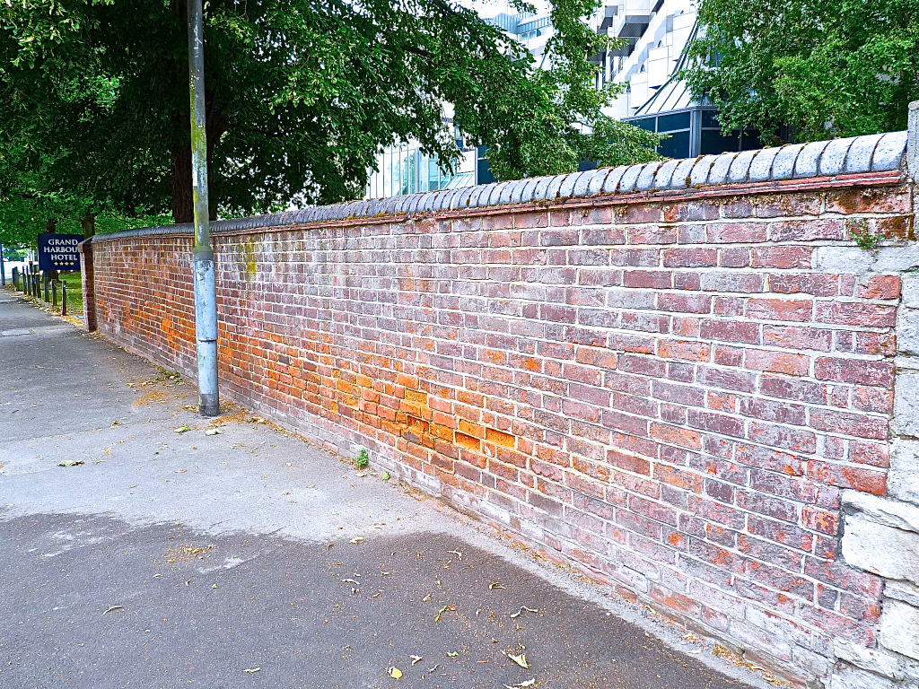 The boundary wall of the troop embarkation site at West Quay. © Southampton Old Lady